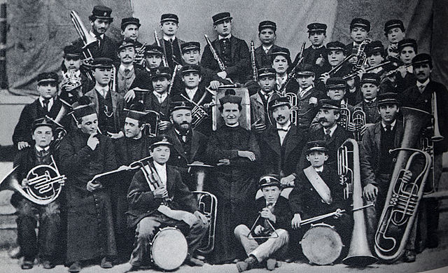 Don Bosco mit einer Musikkapelle aus Jugend seines Hauses